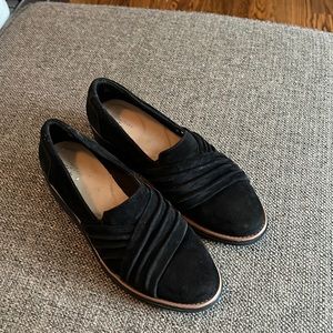 Black suede Clark’s loafers